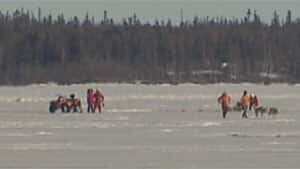 mi-yellowknife-bay-ice-rescue-may-2013