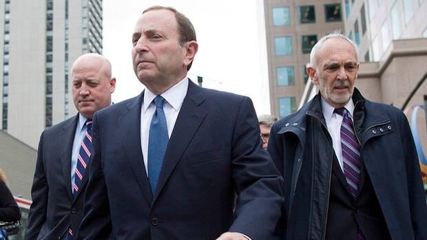 NHL Commissioner Gary Bettman, centre, said late Wednesday night that some progress was made during meetings with the NHLPA. Fans were quick to react on Twitter to yet another disappointing night that ended without a new labour deal.