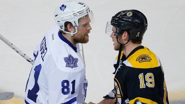 Toronto Maple Leafs' Phil Kessel, left, shakes hands with Boston Bruins' Tyler Seguin after the Bruins defeated the Leafs in overtime in Game 7 on Monday.