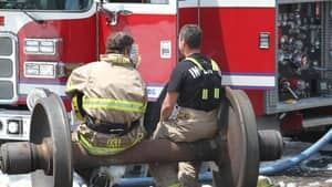 sq-image-firefighters-sit-852-4col