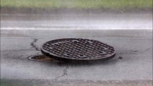 Manhole cover lifted off