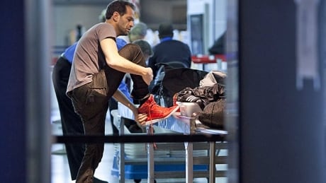 From stripping down to identifying all liquids and gels, going through airport security can be a stressful experience. hi-airport-security-shoes-8