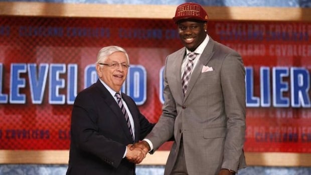 Canadian Anthony Bennett, right, shakes hands with NBA Commissioner David Stern, left, after being selected by the Cleveland Cavaliers as the first overall pick in the 2013 NBA Draft Thursday in Brooklyn, N.Y.