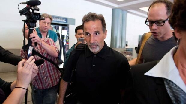 John Tortorella, centre, would be a good fit for the Vancouver Canucks.