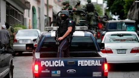 hi-bc-120305-gangs-mexico-8col