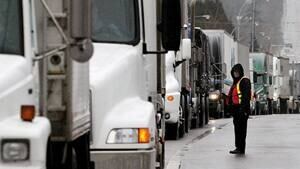 mi-bc-archive-trucks-border-crossing-surrey-reuters