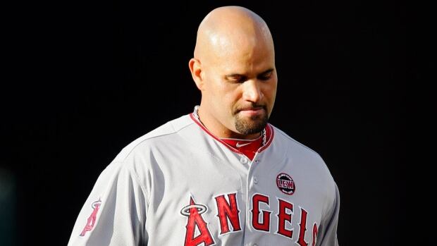 Pujols is risking his baseball career by playing hurt