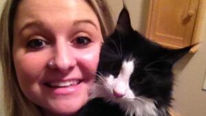 Jennifer McLaren was hurt when she tried stopping a pit bull's attack on her cat