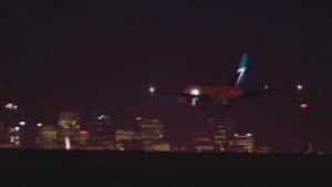 tp-cgy-westjet-plane-night