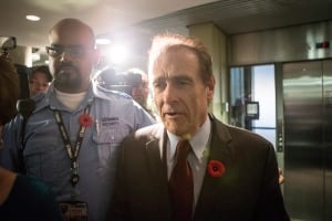Deputy Mayor Norm Kelly talks to mayor after video release
