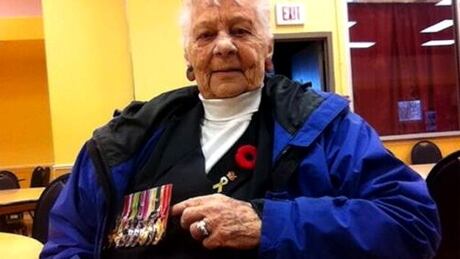 Madrien Ferris wearing medals