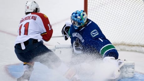 Jonathan Huberdeau helps Panthers edge Canucks in SO