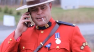 RCMP Cpl. Ron Francis smoking marijuana