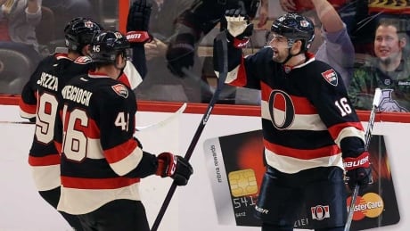 Ottawa Senators forward Clarke MacArthur (16) celebrates his goal with teammates Patrick Wierciock (46) and Jason Spezza (19) during the first period against the Philadelphia Flyers in Ottawa Monday. Ottawa Senators