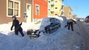 Shovelling snow on Bond St., St. John's, Jan. 2, 2014