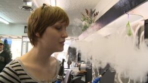 Shai Connors uses an e-cigarette