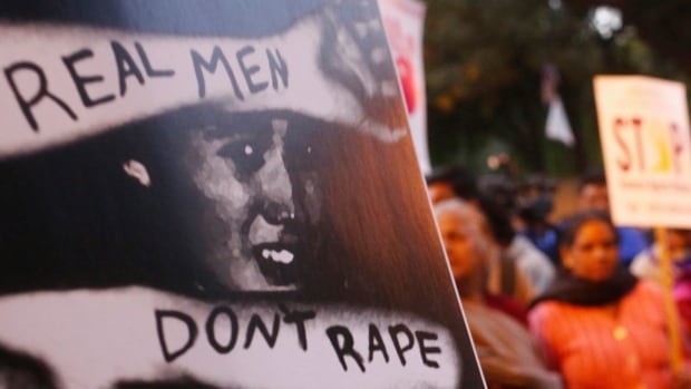 Demonstrators marked the first death anniversary of the Delhi gang rape victim in New Delhi in December 2013. An outpouring of anger was seen across India after a 23-year-old woman died following a gang rape on a moving bus.