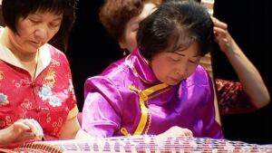 Performers celebrate the year of the horse.