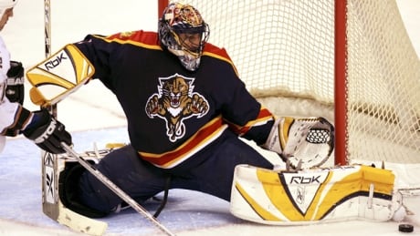 SUNRISE, FL - MARCH 22: Goaltender Robert Luongo #1 of the Florida Panthers makes a save on shot attempt by Chris Clark #17 in the third period on March 22, 2006 at Bank Atlantic Center in Sunrise, Florida. luongo-roberto-060322