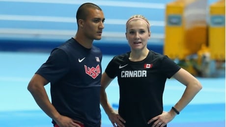 Ashton Eaton, left, of the United States, and Brianne Theisen Eaton of Canada talk during the first day of events at the IAAF World Indoor Championships at Ergo Arena in Sopot, Poland on Friday. 620-theisen-eaton