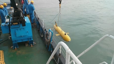B.C. submarine expert Peter Kowalczyk says it will cost tens of millions of dollars to bring the flight wreckage up from the ocean floor. Underwater exploration - submarine - stock