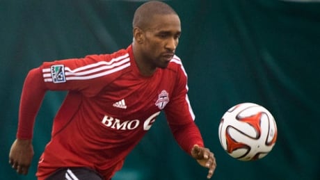 Toronto FC's Jermain Defoe takes part in a drill at practice in Toronto on Monday. The MLS club opens its season Saturday in Seattle. 620-jermain-defoe-tfc