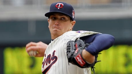 Twins starting pitcher Kyle Gibson delivers to the Blue Jays in the third inning Thursday in Game 1 of a day-night doubleheader. He pitched a career-high eight shutout innings, leading Minnesota to a 7-0 victory. gibson-kyle-06202230
