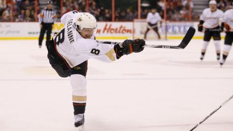 OTTAWA, ON - JANUARY 18: Teemu Selanne #8 of the Anaheim Ducks fires a hard slapshot off the post in a game against the Ottawa Senators at Scotiabank Place on January 18, 2011 in Ottawa, Canada. selanne-teemu-110118