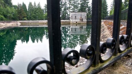The Mount Tabor number 1 reservoir in Portland, Ore., is seen in a June 20, 2011 photo. Portland officials said Wednesday, April 16, 2014 that they are flushing away millions of gallons of treated water for the second time in less than three years because someone urinated into a city reservoir. In June 2011, the city drained a 7.5 million-gallon reservoir at Mount Tabor in southeast Portland. This time, 38 million gallons from a different reservoir at the same location will be discarded after a 19-year-old was videotaped in the act (AP Photo/The Oregonian, Benjamin Brink) Portland pee in reservoir