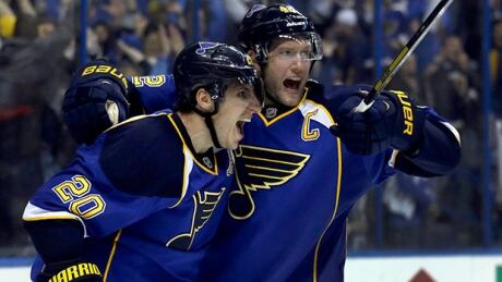 St. Louis Blues veteran Alex Steen, left, is congratulated by teammate David Backes after scoring the game-winning goal during the third overtime against the Chicago Blackhawks Thursday night. alex-steen_620