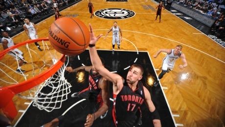 Raptors centre Jonas Valanciunas (17) dunks in a 101-97 loss to the Nets at Barclays Center in Brooklyn, N.Y., on March 10. valanciunas-jonas-140310