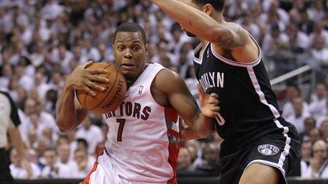 TORONTO, ON - APRIL 22: Kyle Lowry #7 of the Toronto Raptors drives for the net against the Brooklyn Nets in Game Two of the NBA Eastern Conference Quarterfinals at the Air Canada Centre on April 22, 2014 in Toronto, Ontario, Canada. The Raptors defeated the Nets 100-95 to even the series 1-1. NOTE TO USER: user expressly acknowledges and agrees that, by downloading and/or using this Photograph, user is consenting to the terms and conditions of the Getty Images License Agreement. (Photo by Claus Andersen/Getty Images) lowry-kyle-140422-620