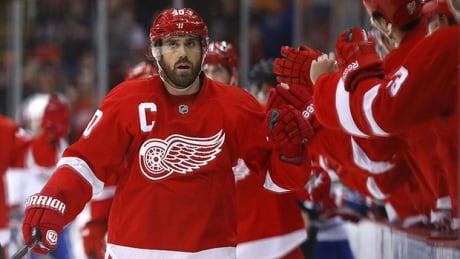 Detroit Red Wings left wing Henrik Zetterberg (40), of Sweden, celebrates his goal against the Montreal Canadiens in the first period of an NHL hockey game, Friday, Jan. 24, 2014, in Detroit. (AP Photo/Paul Sancya) zetterberg-140124-620