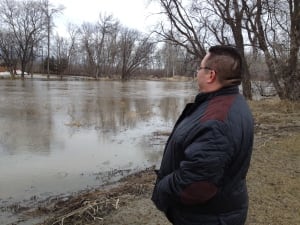 Chief of Peguis First Nation Glenn Hudson looking at Fisher River