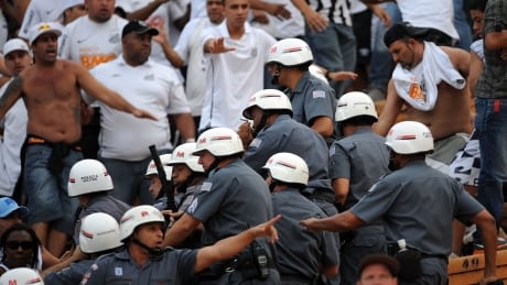 Violence between supporters of rival clubs in Brazil is a growing problem that authorities are trying to deal with. Brazil fan violence 620