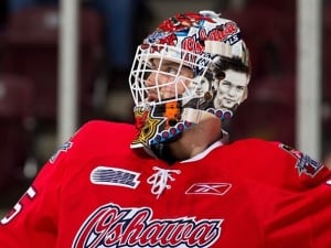 Peter Di Salvo wearing his Sum 41 goalie mask