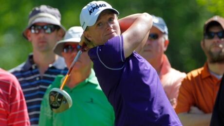Stacy Lewis hits a shot from the ninth tee box in the second round of the ShopRite LPGA Classic in Galloway, N.J., on Saturday. lewis-stacy-140531