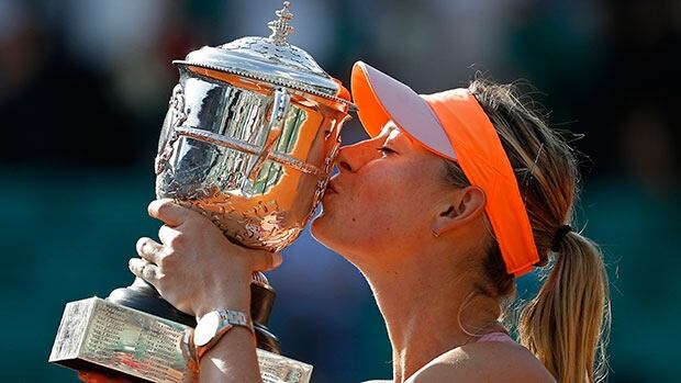 http://i.cbc.ca/1.2668411.1402162989!/fileImage/httpImage/image.jpg_gen/derivatives/16x9_620/maria-sharapova.jpg