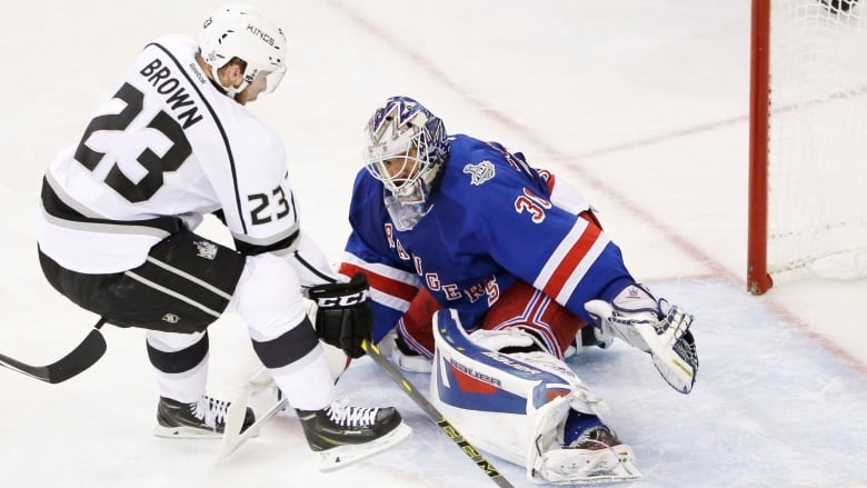 Kings Captain Dustin Brown (23) Scores On Henrik Lundqvist In A 2-1 Road Loss To The Rangers In Game 4 On Wednesday Night. Kings Captain Dustin Brown (23) Scores On Henrik Lundqvist In A 2-1 Road Loss To The Rangers In Game 4 On Wednesday Night.