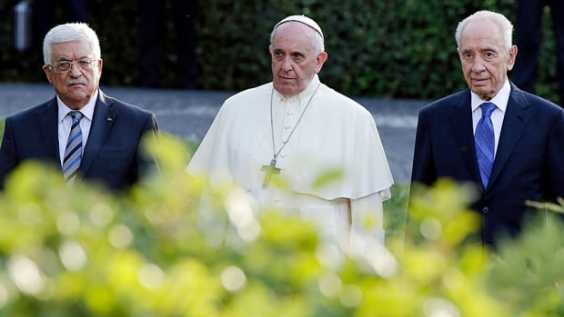 Palestinian President Mahmoud Abbas, Pope Francis and Israeli President Shimon Peres arrive in the Vatican Gardens to pray together on June 8, 2014. Politics is love, Francis said later.