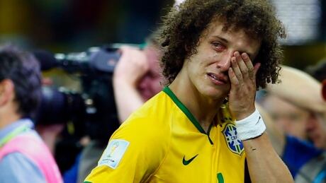 Brazil's David Luiz cries after his team lost to Germany in their 2014 World Cup semi-finals at the Mineirao stadium in Belo Horizonte July 8, 2014. REUTERS/Eddie Keogh (BRAZIL - Tags: SOCCER SPORT WORLD CUP) - RTR3XPEC SOCCER-WORLD/M61-BRA-GER