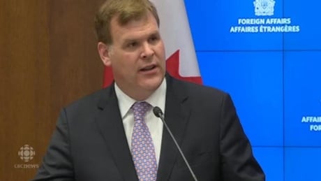 Eritrea must stop collecting a tax from Eritreans in Canada or the African nation's consulate here will be closed, Foreign Affairs Minister John Baird said Wednesday. Foreign Affairs Minister John Baird