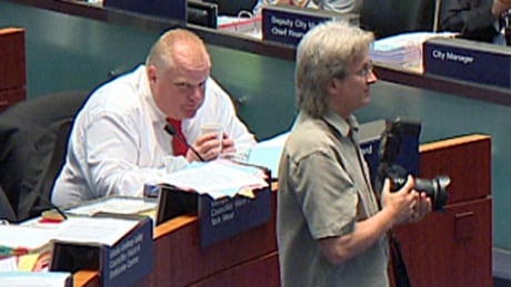 Toronto Mayor Rob Ford applauded, but stayed seated during a standing ovation for WorldPride organizers at city hall on Wednesday, July 9, 2014. Mayor Rob Ford at council on July 9, 2014