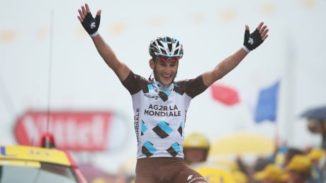 Blel Kadri of France and AG2R La Mondiale celebrates crossing the finish line and winning the eighth stage of the 2014 Tour de France, a 161km stage between Tomblaine and Gerardmer La Mauselaine, on Saturday. 496131327GA00001_Le_Tour_de