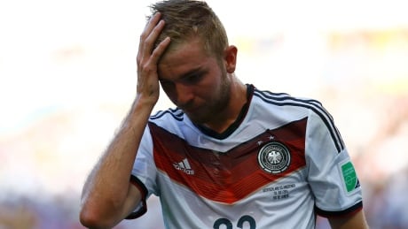 German midfielder Christoph Kramer continued playing after suffering an apparent head injury early in the FIFA World Cup final. He was eventually substituted in the 31st minute and appeared wobbly. Christoph-Kramer-Germany