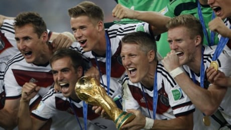 From left to right, Germany’s Miroslav Klose, captain Philipp Lahm, Kevin Grosskreutz, Bastian Schweinsteiger and Andre Schuerrle celebrated with the World Cup trophy after their team's 1-0 victory over Argentina Sunday at the Maracana Stadium in Rio de Janeiro. germany-world-cup-620