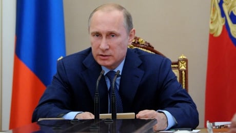 Russia's President Vladimir Putin speaks as he chairs a Security Council meeting in the Kremlin in Moscow, on July 22, 2014. Putin promised today to do everything possible to influence pro-Russian separatists in eastern Ukraine and help ensure a full probe into the Malaysia Airlines crash last week. AFP PHOTO/ RIA-NOVOSTI/ POOL/ MIKHAIL KLIMENTYEV (Photo credit should read MIKHAIL KLIMENTYEV/AFP/Getty Images) Vladimir Putin MH17 comment