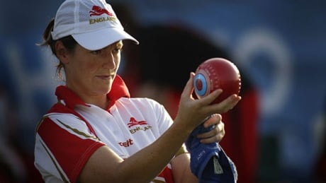 England's Amy Monkhouse checks the ball before bowling against Australia in their women's lawn bowls pairs semifinals during the Commonwealth Games at the Jawaharlal Nehru Sports Complex in New Delhi, India, Monday, Oct. 11, 2010. (AP Photo/ lawn-bowls-620