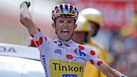 Poland's Rafal Majka crosses the finish line to win the 17th stage of the Tour de France on Wednesday. Rafal Majka