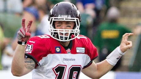 Calgary Stampeders quarterback Bo Levi Mitchell (19) calls a play against the Edmonton Eskimos during first half action on Thursday. CFL Stampeders Eskimos 20140724